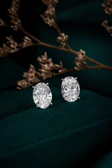 PT950 Platinum Oval Diamond Four Prong Stud Earrings (1ct/p)