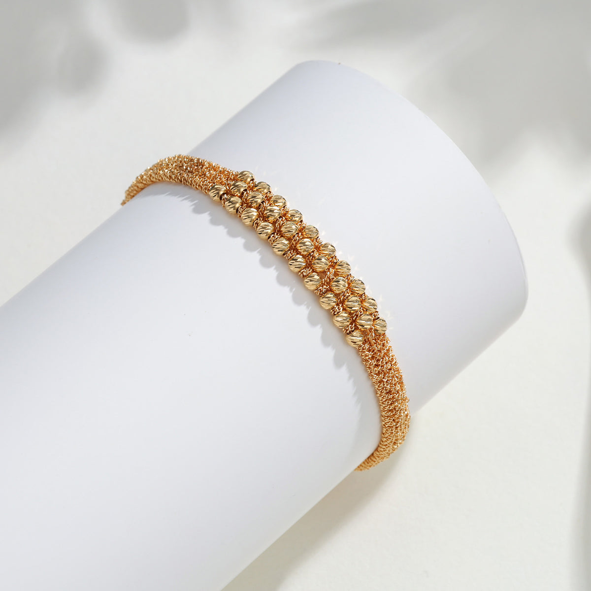 K18 Solid Diamond cut Bracelet