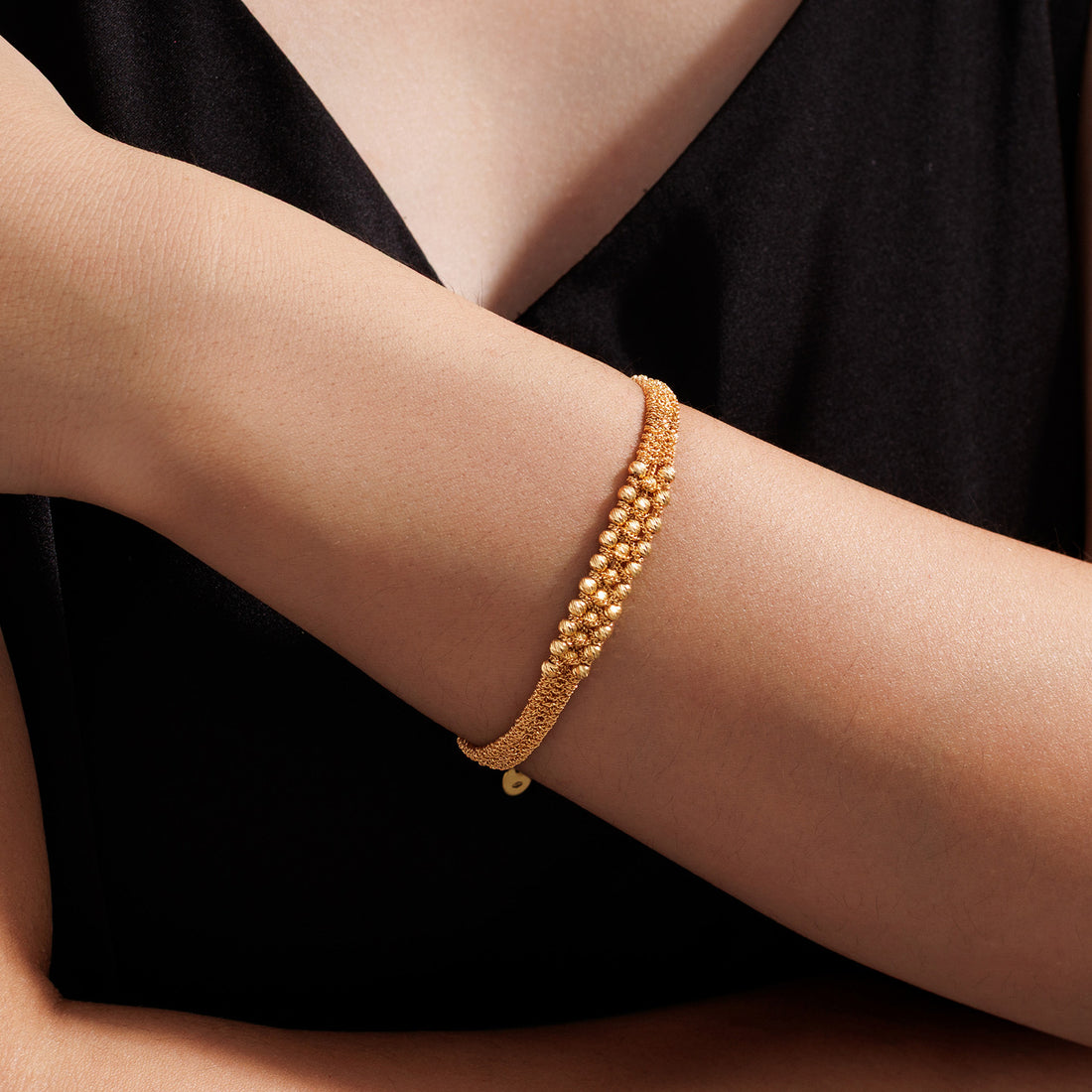 K18 Solid Diamond cut Bracelet