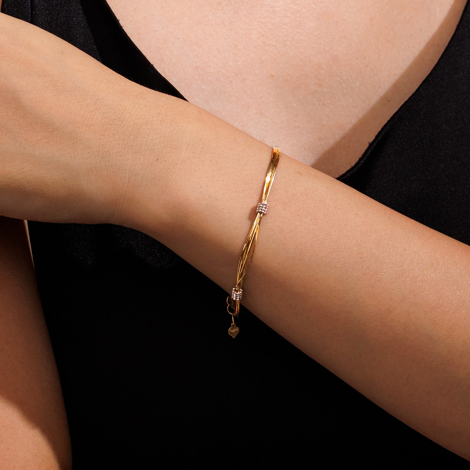 18K Yellow Gold Tassel Twisted Snake Bone Station Bracelet