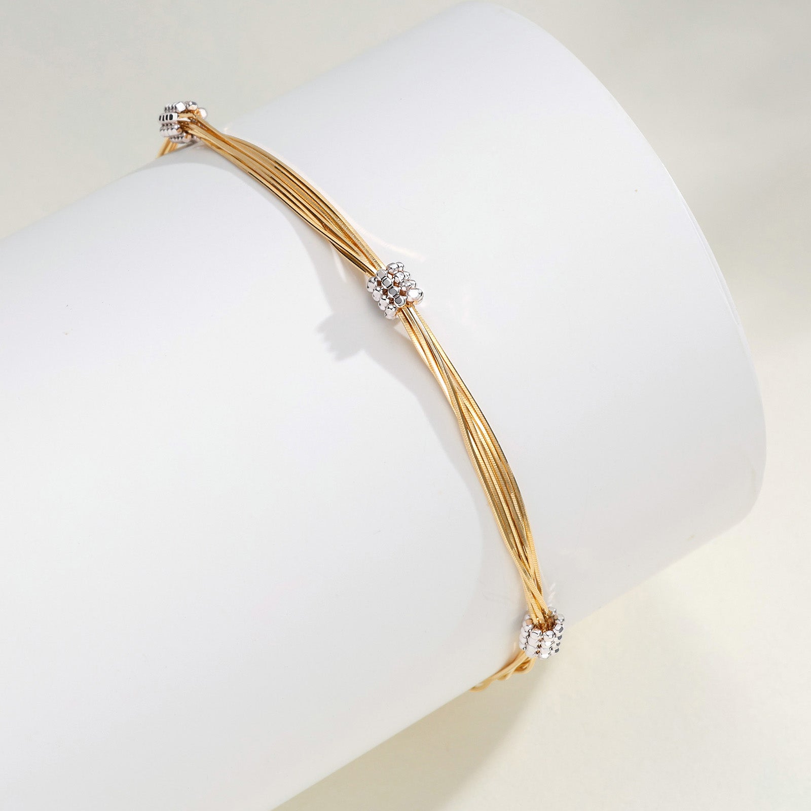 18K Yellow Gold Tassel Twisted Snake Bone Station Bracelet