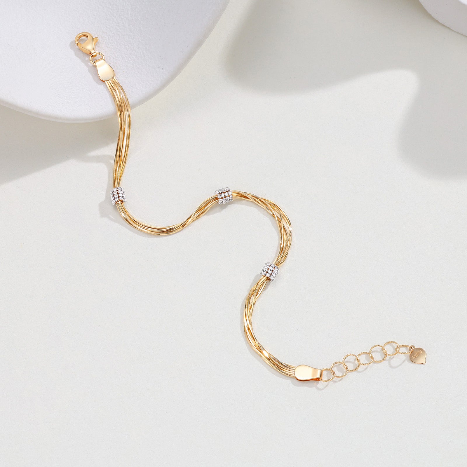 18K Yellow Gold Tassel Twisted Snake Bone Station Bracelet