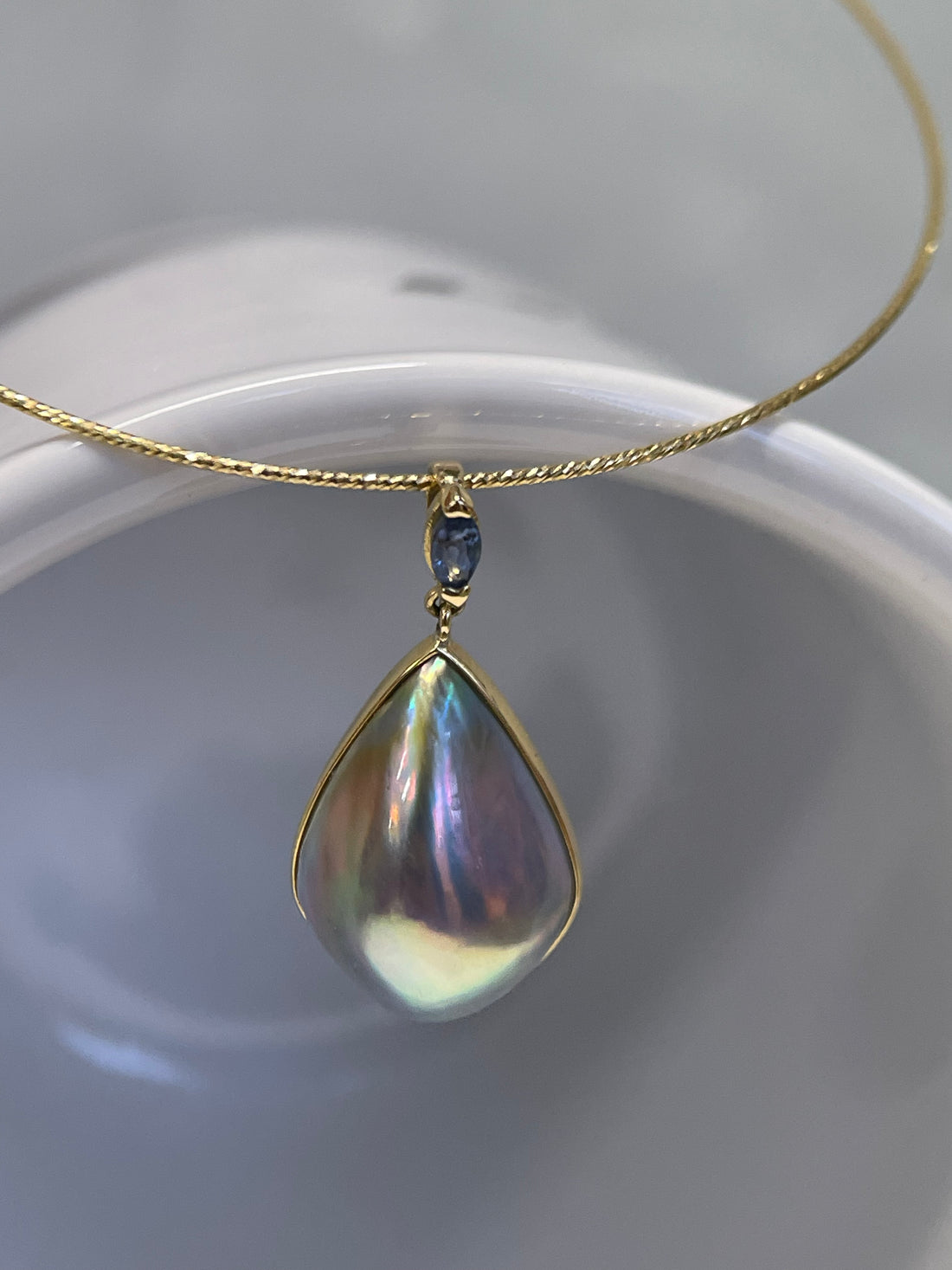 Pear-Shaped Mabe Pearl & Blue Sapphire Pendant in 18K Gold